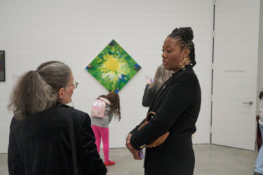 Afesha Wilkins, right, in conversation at OSMOSIS exhibition.