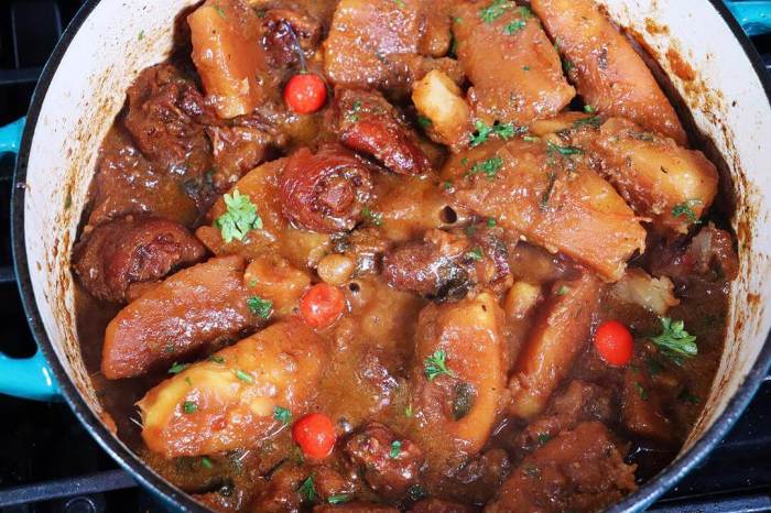 Breadfruit With Smoked Pigtails Simmered In Coconut Milk.