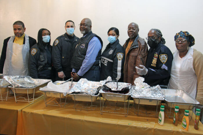 NYPD and Mechanic Order officers ready to serve Thanksgiving meal.