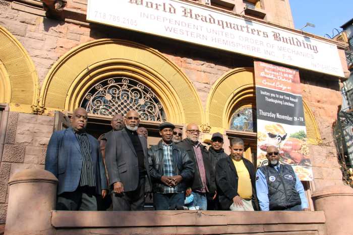 IUOM officers assemble on the balcony of the Mechanics Order headquarters at 65 Putnam Ave. in Bedford-Stuyvesant, Brooklyn.