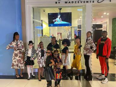 Young models pose in creations by 11-year old fashion designer Amirah Holmes, at Qumara Boutique, Rockland County Fashion Week.