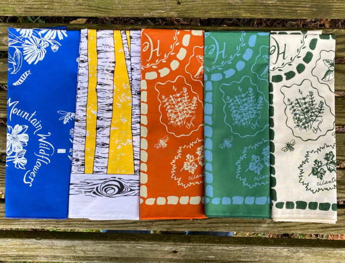 Some bandanas designed by Anne Valenta for her business, NV Creations.