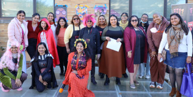 Aminta Kalawan, founder and executive director of SQMW (front,third from left), surrounded by members at the first Fall Harvest Festival to promote civic engagement in Queens.