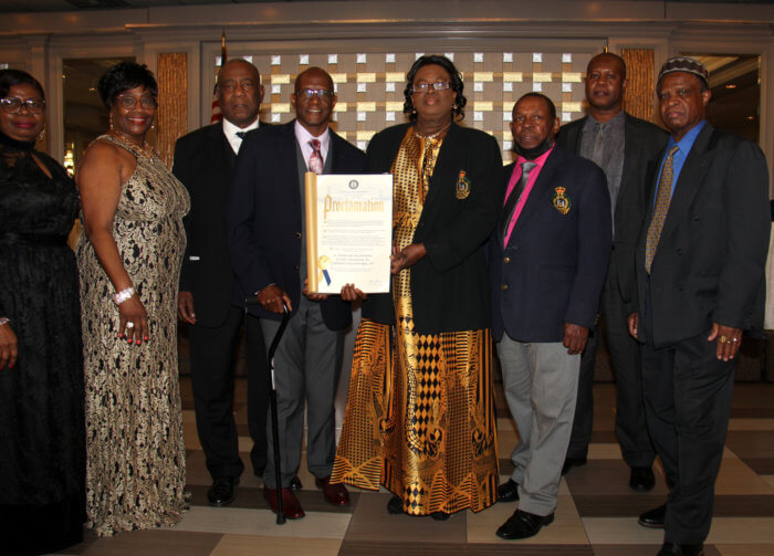 St. Vincent and the Grenadines Ex-Police Association, U.S.A., Inc. receives proclamation from Ancilla Friday on behalf of Brooklyn Borough President Antonio Reynoso.
