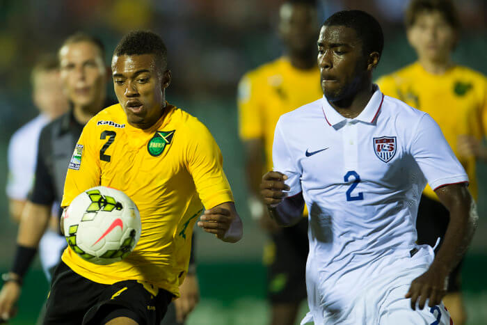 Shaq Moore of the United States and Khalil Stewart of Jamaica at the CONCACAF Under-20 Championship on Jan. 18, 2015 at Stadium, Montego Bay Sports Complex.