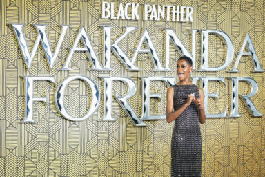 Letitia Wright poses for photographers upon arrival for the premiere of the film 'Black Panther: Wakanda Forever' in London, Thursday, Nov. 3, 2022.
