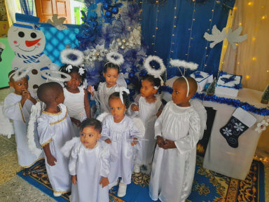 Kids dressed in a Nativity scene at the Green Acres Christmas parade in Georgetown, Guyana.