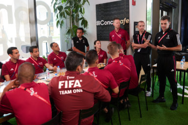 Left to right, Drew Fischer, Mark Geiger and Nicola Rizzoli at the Concacafe in Qatar.