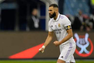 Real Madrid's Karim Benzema reacts after he scored during penalty shootout during a semi-final of the Spanish Super Cup between Real Madrid and Valencia in Riyadh, Saudi Arabia, Wednesday, Jan. 11, 2023.