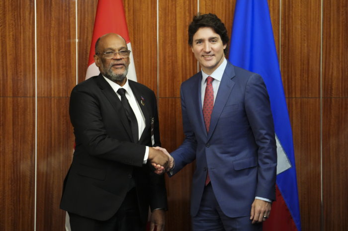 Prime Minister Justin Trudeau, right, takes part in a bilateral meeting with Prime Minister of Haiti Ariel Henry during the Conference of Heads of Government of the Caribbean Community (CARICOM) in Nassau, Bahamas, on Thursday, Feb. 16, 2023.