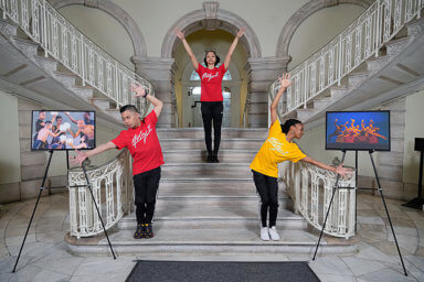 Photos from Alvin Ailey Moves NYC! on display in the City Hall Rotunda.