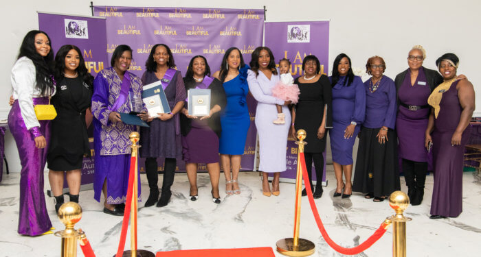 From left, Apostle Dr. Chloe Natacha, ANS CEO/president, Marie St. Gilles, ANS Deputy, Evangelist Rose Perrier-Tonico, ANS Ambassador, Nodia Nesbeth, ANS Ambassador, Monica Lighty, ANS Ambassador, Carol Elias, ANS member, Debbie Louis, honoree, Margarette Tropnas, ANS member, Frances Pean, honoree, Rose Graham, Honoree Darlyne Degramont, ANS deputy and Claudine Calixte, ANS deputy. 