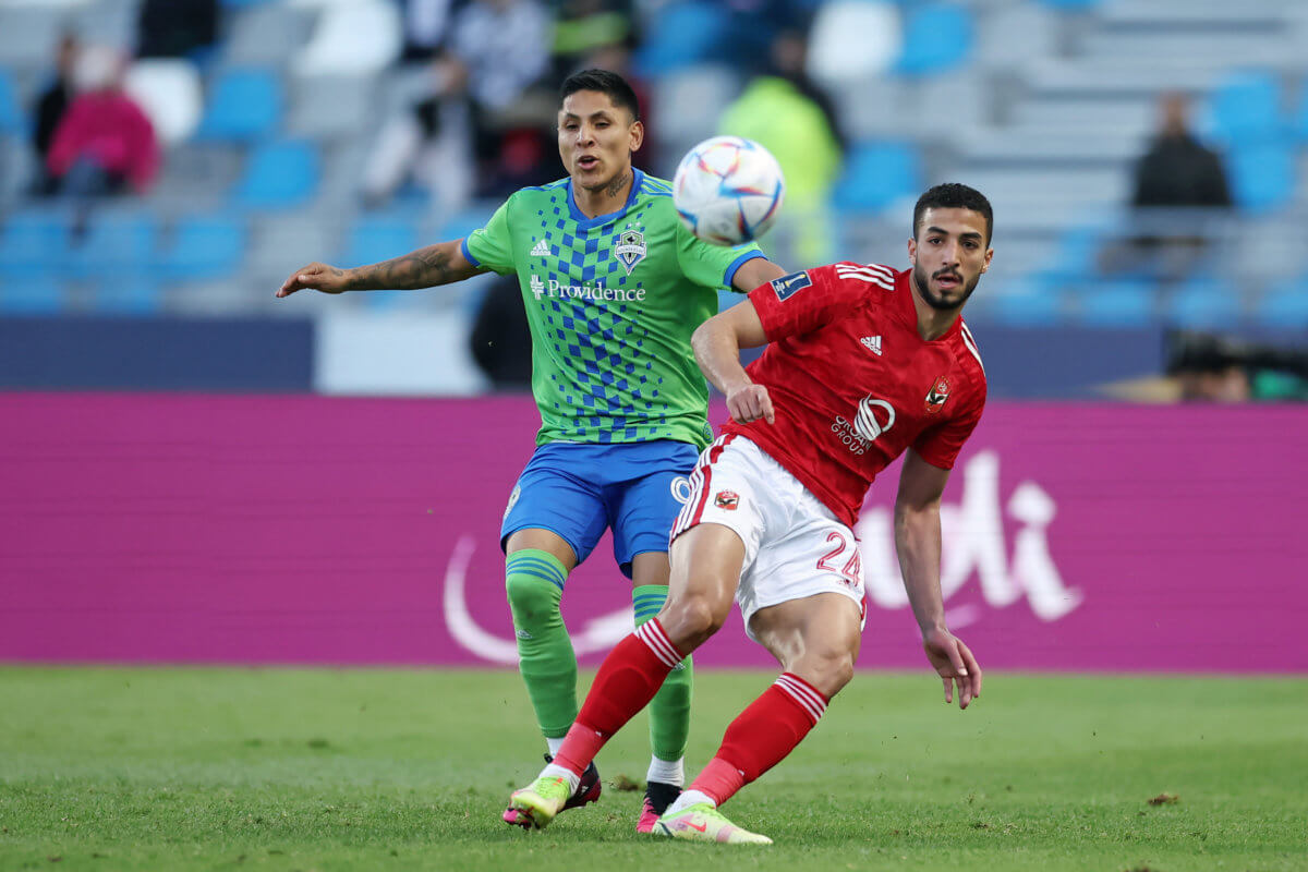 Mohamed Abdelmoneim of Al Ahly FC battles for possession with Raul Ruidiaz of Seattle Sounders