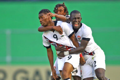 ANTIGUA, GUATEMALA. FEB. 15: Lindell Sween #9 of Trinidad celebrating his goal during the Group F match between Trinidad and Barbados in the Concacaf Men's Under-17 Championship, held at the Pensativo stadium, in Antigua City, Guatemala.