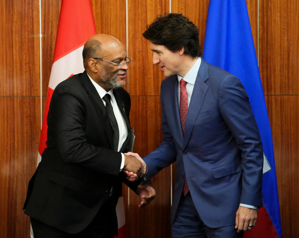 Prime Minister Justin Trudeau, right, takes part in a bilateral meeting with Prime Minister of Haiti Ariel Henry
