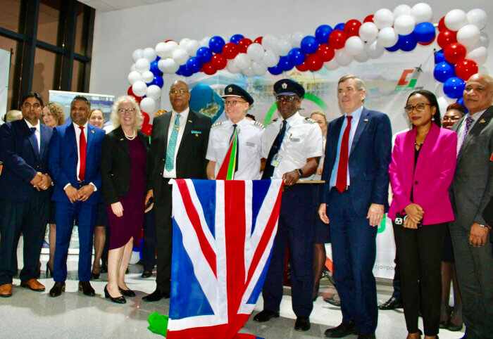 Officials celebrate the arrival of British Airways’ inaugural flight #2158 from the UK, via St. Lucia. From left, Chairman of the CJIA board, Sanjeev Datadin, Minister within the Ministry of Public Works Deodat Indar, British High Commissioner, Ambassador Jane Miller, Minister of Public Works Bishop Juan Edghill, Guyanese heritage, Captain Marc Chang, Anguilla heritage, Senior First Officer, Alan Brooks, British Minister David Rutley, Minister of Tourism, Industry and Commerce, Oneidge Walrond, and St. Lucia Minister for Tourism, Investment, Creative Industries, Culture and Information, Ernest Hilaire.