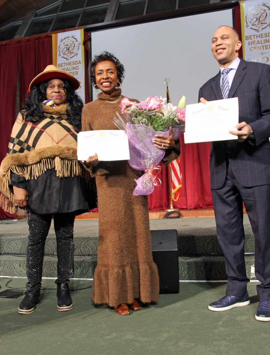 Congressman Jeffries and Congresswoman Clarke receive a proclamation from Ira Lewis, executive legislative aide of East Orange, NJ Council Manager Britnee N. Timberlake.