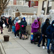 Residents joined long lines outside Calvary's Mission Food Pantry in Richmond Hill, Queens, during talk of rising food insecurity.