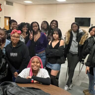 Katherine V. Charles (front left) with the teenage girls that she mentors at Spring Valley High School, in New York. 