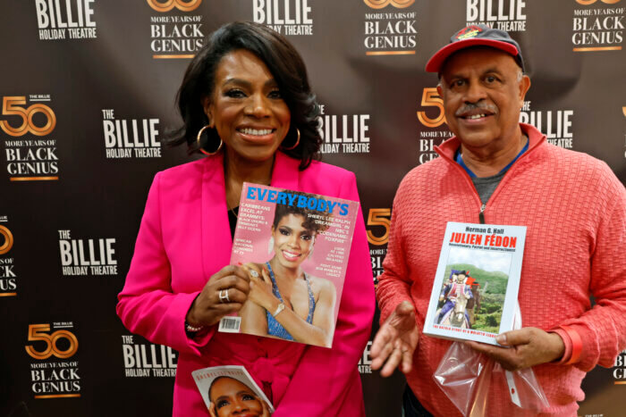 In Bed-Stuy, Brooklyn recently, Sheryl Lee Ralph displays her 1985 Everybody's Magazine cover story alongside publisher Herman Hall.