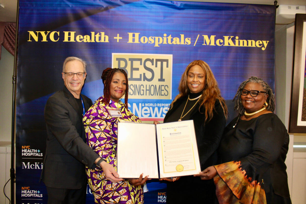From left David Weinstein, CEO, NYC Health+Hospitals McKinney, Ann Marie Whyte Akinyooye, Anita Taylor, and Angela Cooper, during the handing over of a Proclamation from Congresswoman Yvette D. Clarke's Office.