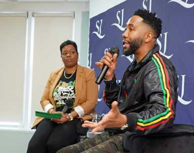 Ndaba Thembekile Zweliyajika Mandela speaking to workers at the St. John’s Episcopal Hospital.