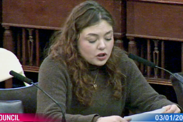 A screen grab of Isabelle Leyva, an organizer at the New York Civil Liberties Union, testifying on behalf of the organization at the hearing. 