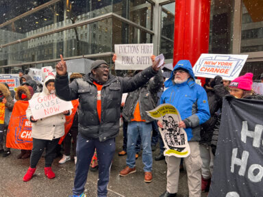 Tenants protest Gov. Kathy Hochul at a rally for Good Cause eviction protections.