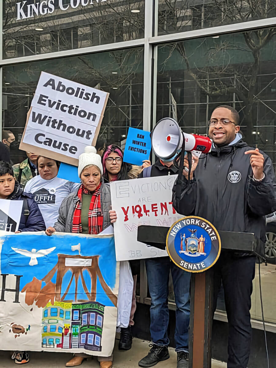 Sen. Zellnor Y. Myrie outside Brooklyn Housing Court.