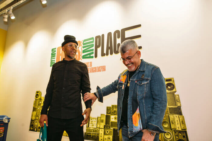 Artists Malik Yusef Cumbo (r) and Joe Conzo Jr. (l) at artist reception of CCCADI's Rhythm, Bass and Place exhibition on March 24, 2023.