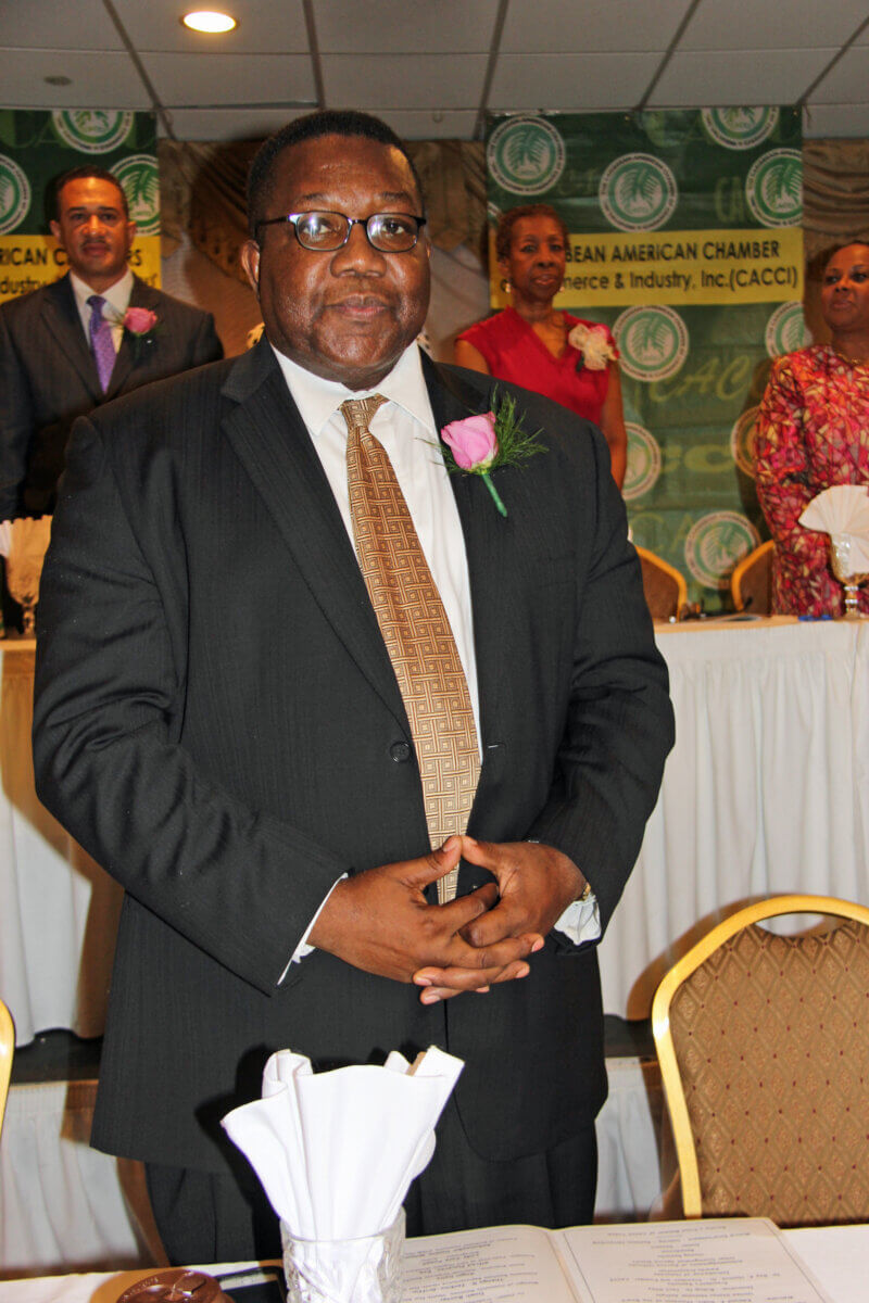Former UN Ambassador Dennie Wilson at CACCI honor ceremony in July 2014.