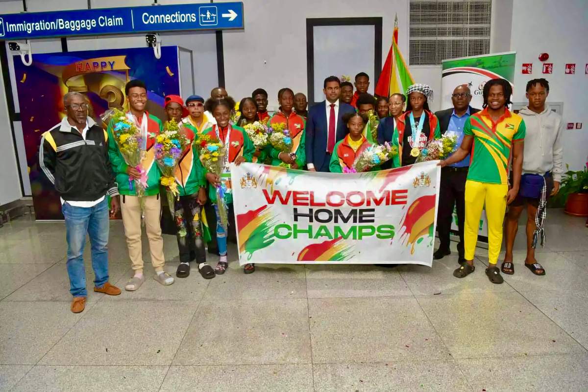 Guyanese athletes received a hero's welcome from Minister of Culture Youth & Sport, Charles Ramson Jr. center, family, friends, fans, and sporting officials at the Cheddi Jagan International Airport, after arriving from the 50th CARIFTA Games, and Nassau, Bahamas recently, where they ranked #5 overall in the games.