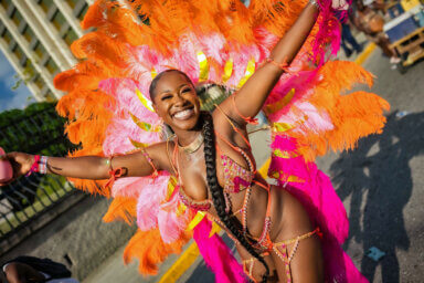 A masquerader participates in Jamaica Carnival.
