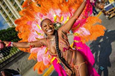 A masquerader participates in Jamaica Carnival.