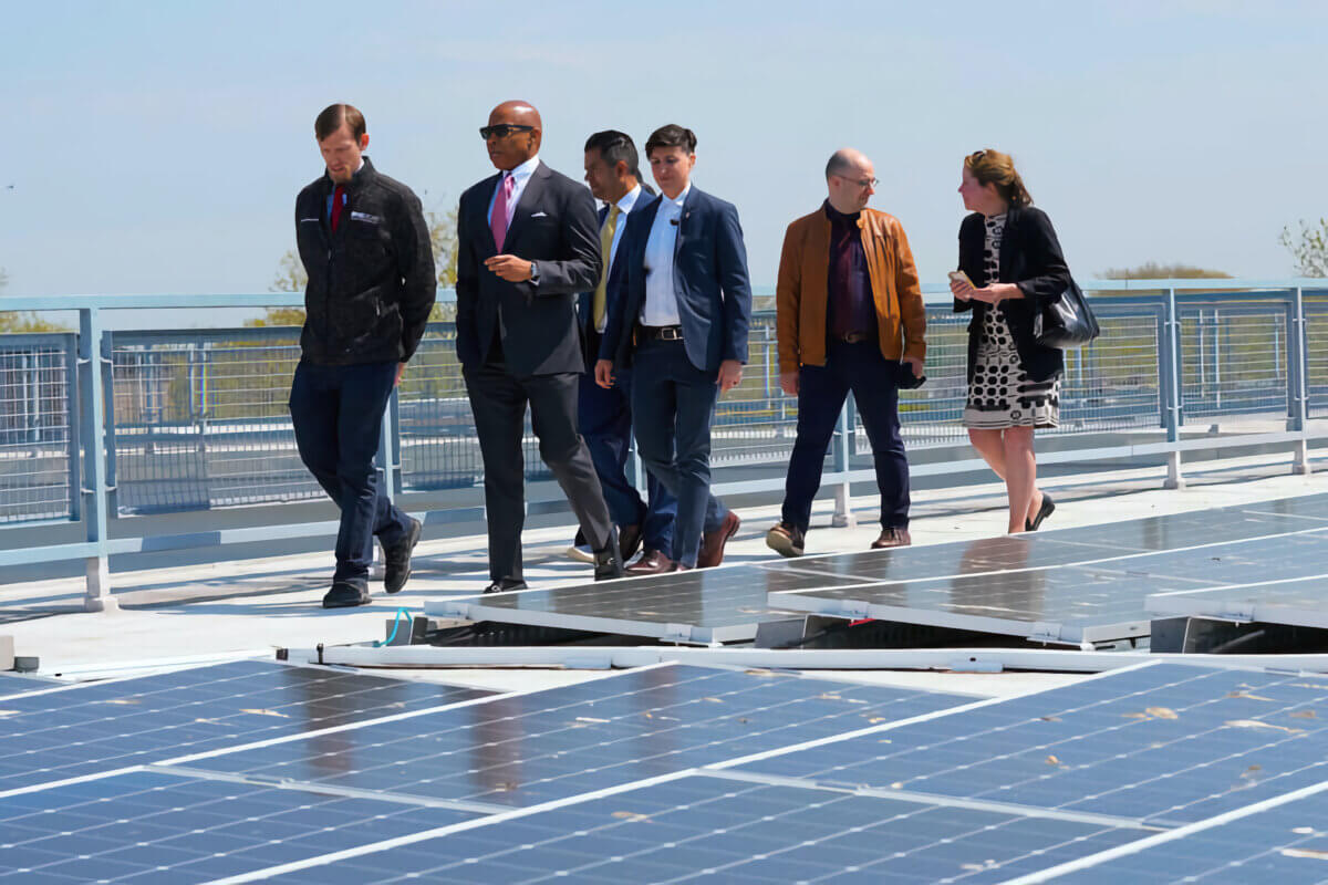 Mayor Eric Adams and officials visit a solar installation.