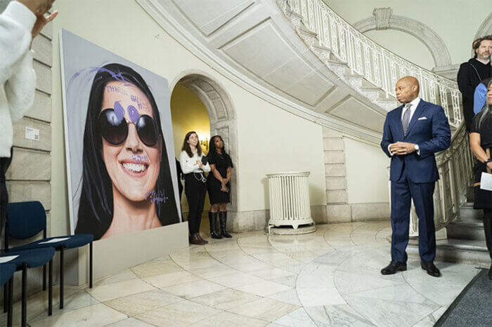 Mayor Eric Adams unveils collaborative portraits by artist Roy Nachum.
