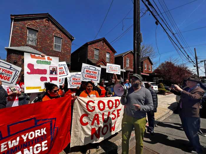 David Alexis speaks at a protest against Sen. Kevin Parker.