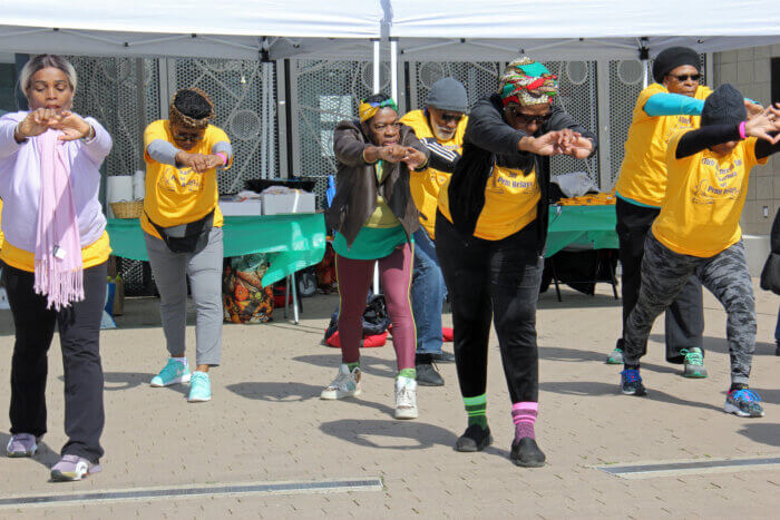 Participants warming up for the walkathon.