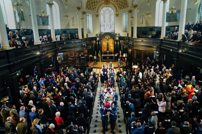 The coffin of former RAF Sergeant Peter Brown is carried out after his funeral service, at St Clement Danes Church, in London, Thursday, May 25, 2023. Jamaican born Flight Sgt. Peter Brown who flew bombing missions in World War II after volunteering for the Royal Air Force died in December, aged 96. Volunteers tried to track down family and people who knew him. Word of that search drew interest from others who didn't want him to be forgotten for the service he offered in Britain's darkest hour. 