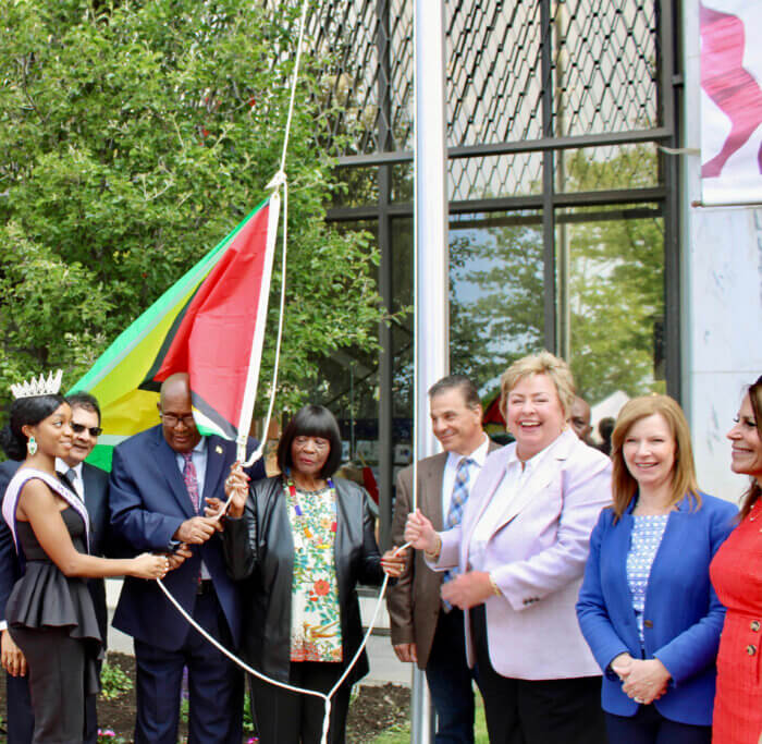 Guyana’s flag being raised, from left, Mrs Guyana International 2023 Malika Manelva Blount, Fazal ‘Joe’ Yussuff, Guyana Consulate NY, Consulate General of Guyana to New York, Ambassador Michael Brotherson, Deputy Supervisor, Town of Hempstead, Dorothy L. Goosby, Councilman Tom Muscarella, Town Clerk Kate Murray, Councilwoman, Laura Ryder, and Receiver of Taxes Jeanine Driscoll.