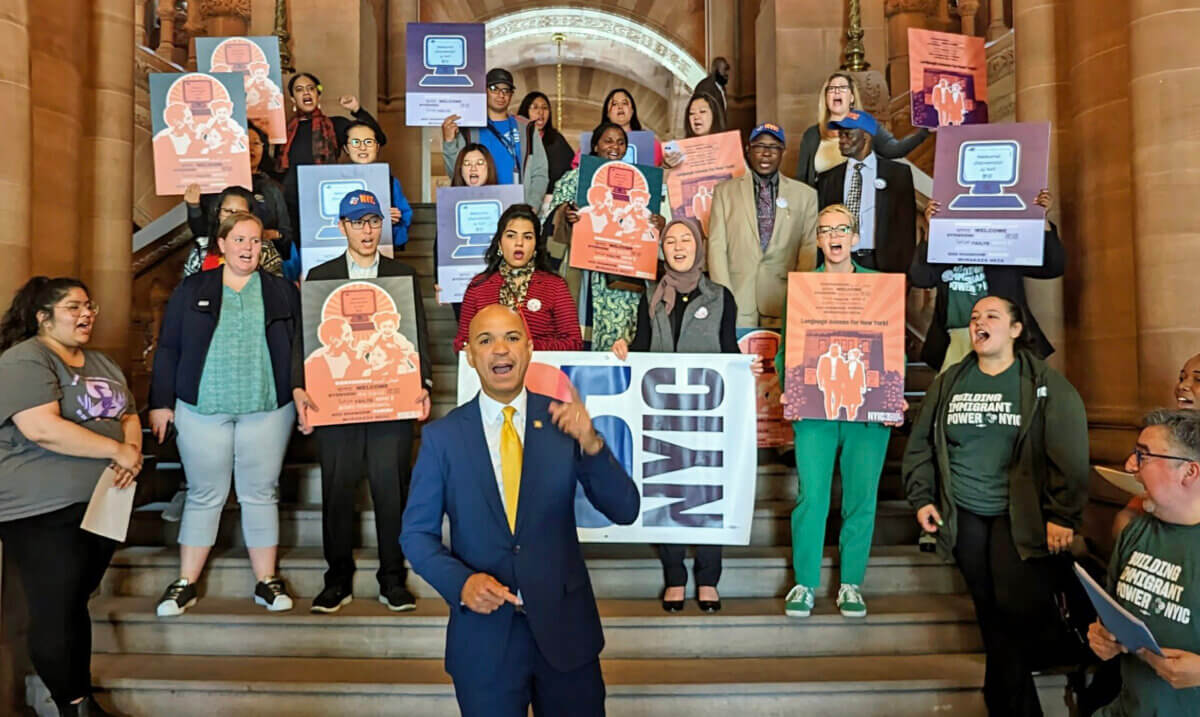 Immigration advocates hold a news conference at the Million Dollar Staircase.