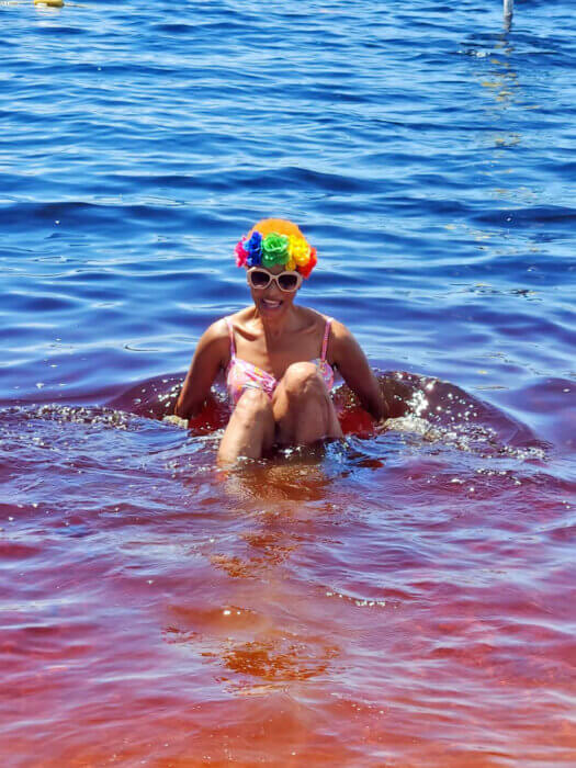 A New York tourist enjoying the cool tea-color water of Lake Mainstay/Whyaka Resort in Essequibo county, Guyana.