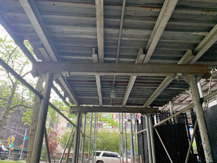 Sidewalk sheds cover more than 2 million feet across New York City, and the city itself often keeps scaffolding up for years. 