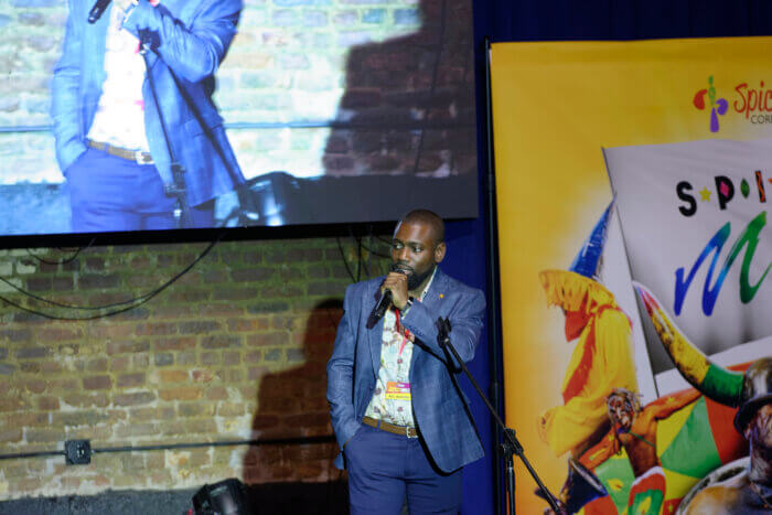 Grenada’s Minister of State with responsibility for Youth, Sports and Culture, Rohan Redhead addressing the audience and officially launching Spicemas in Brooklyn at the Crown Hall Theatre on Nostrand Avenue.