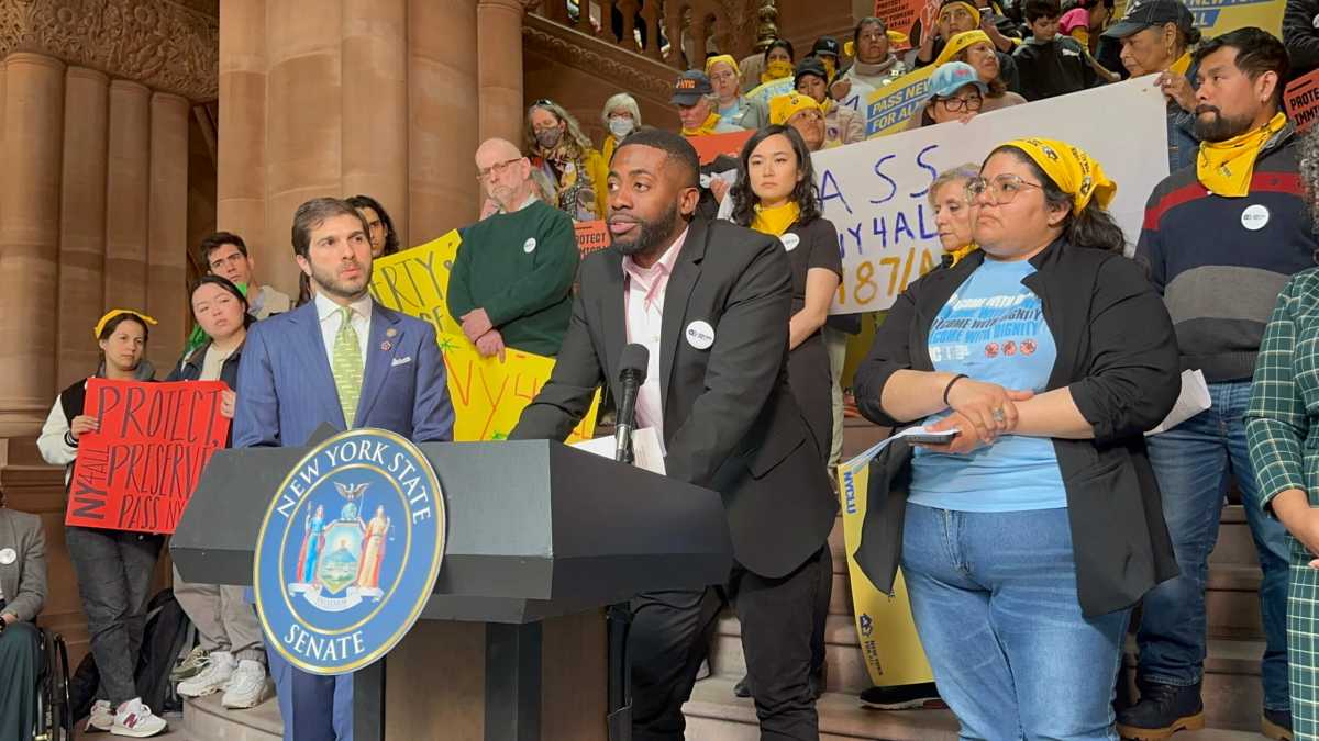 Union and worker justice groups demonstrating in Albany.