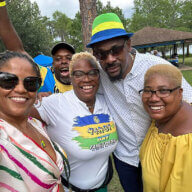 CG Rondy "Luta" McIntosh with picnic-goers in Orlando, Florida.