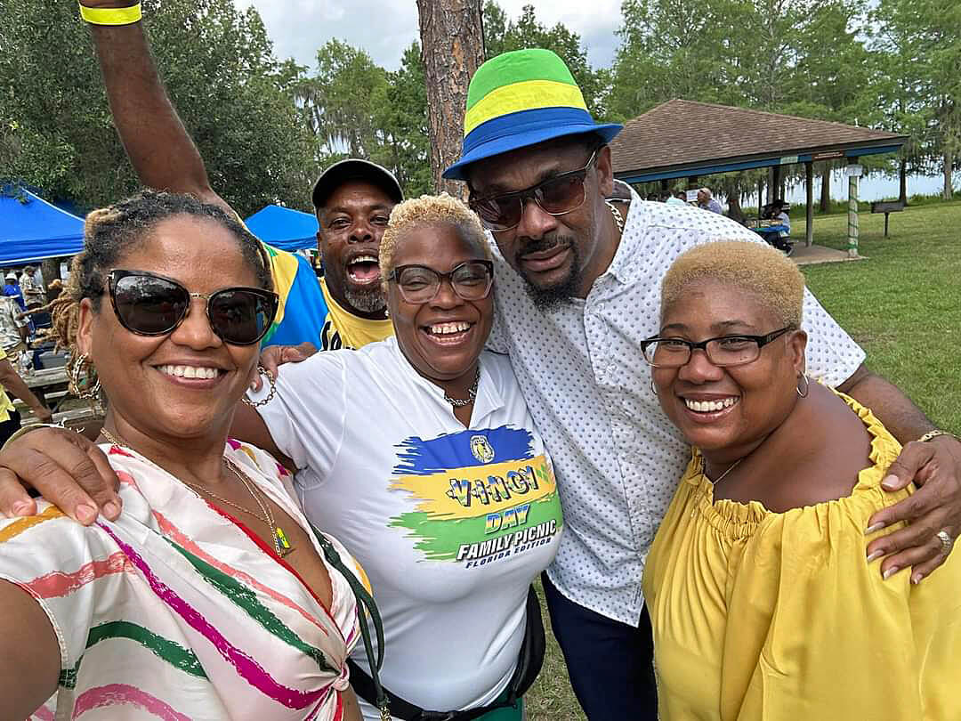 CG Rondy "Luta" McIntosh with picnic-goers in Orlando, Florida.