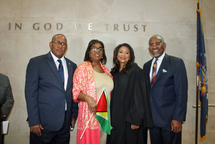 Consul General of Guyana to New York, Ambassador Michael E. Brotherson, Simone-Marie Meeks, Judge Andrea S. Ogle, and Congressman Gregory Meeks, after the induction ceremony, Friday, June 16.