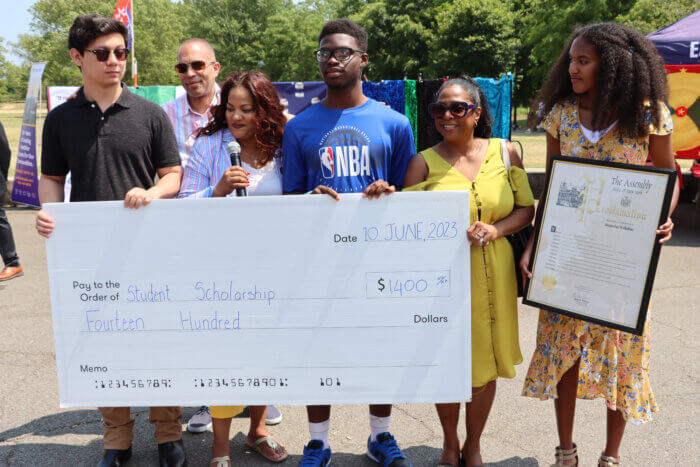 Giving scholarships to college-bound students.