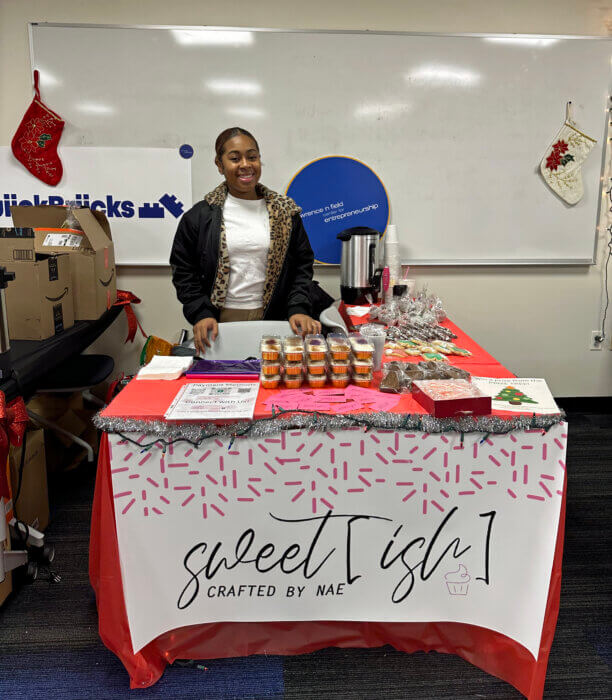 Naomi James Sweet[ish] - selling baked goods at Baruch's Marketplace campus event.